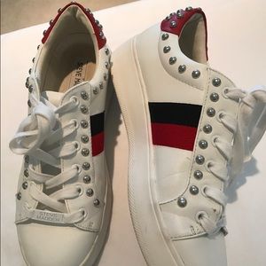 Steve Maden white sneakers.